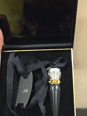 Christian Louboutin Black and Gold Lipstick with Silver Accents